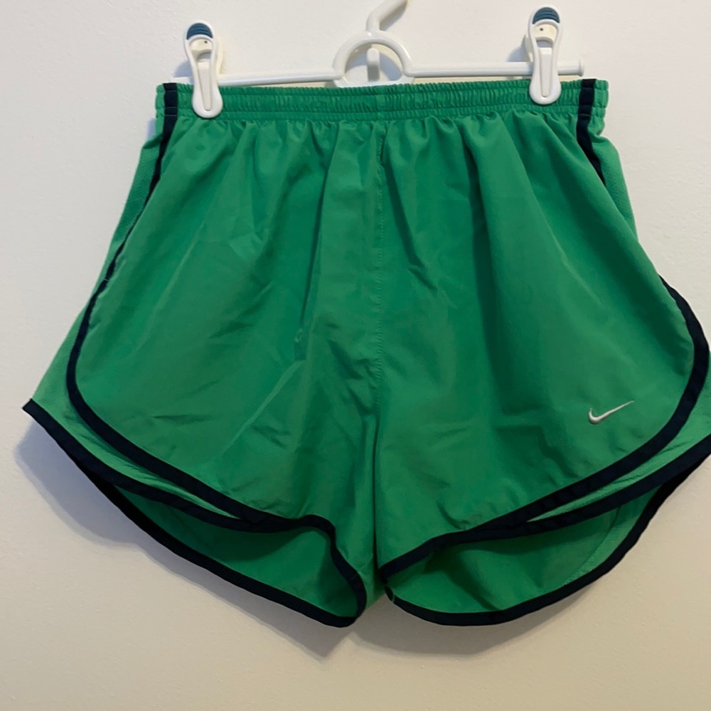 Green and black Nike dri-fit tempo shorts